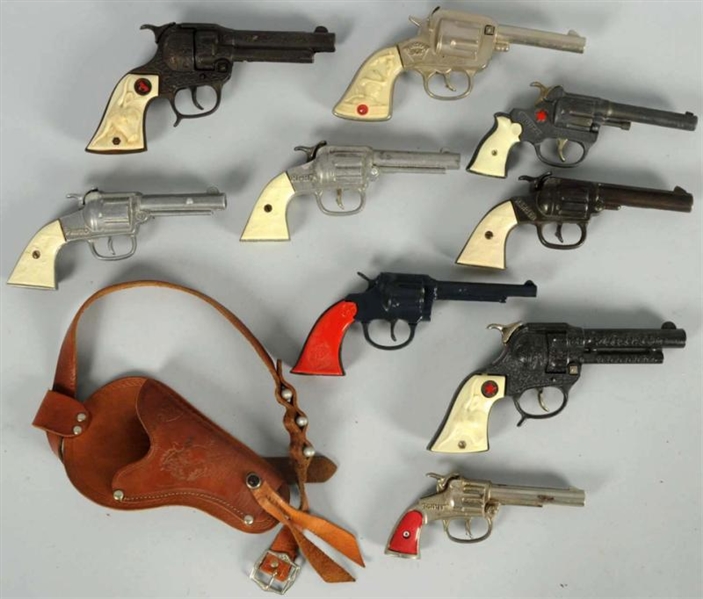 LOT OF 9: ASSORTED CAP GUNS.                      