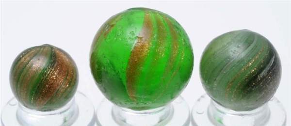 LOT OF 3: GREEN GLASS LUTZ MARBLES.               