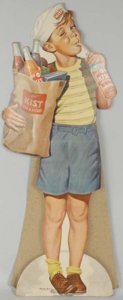 CARDBOARD KIST STAND-UP BOY WITH GROCERIES.       