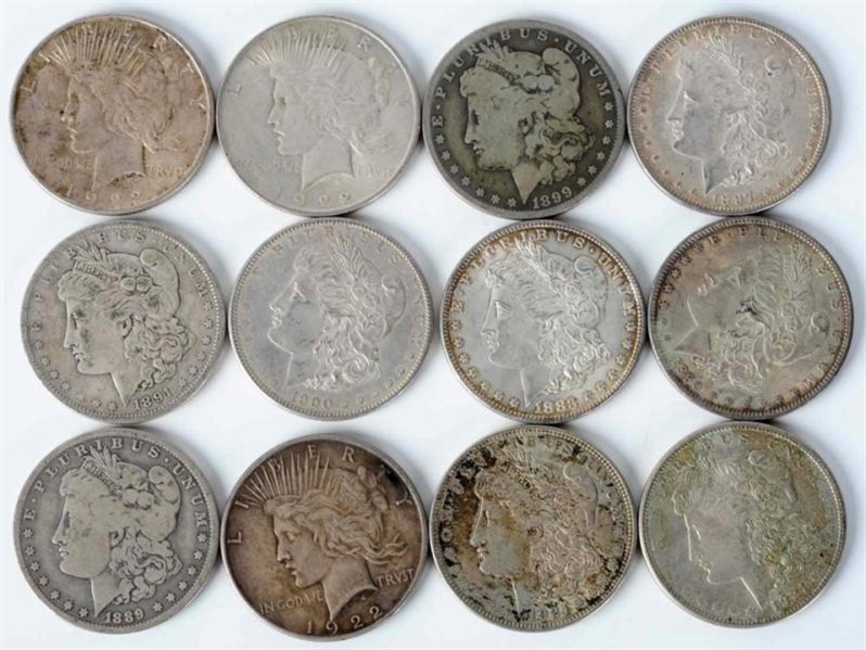 LOT OF 12: SILVER DOLLARS.                        