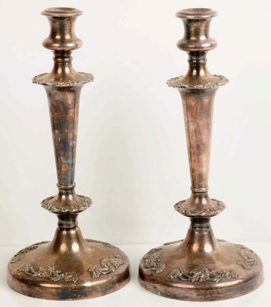 LOT OF 2: WEIGHTED SILVER CANDLESTICKS.           