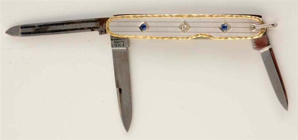 14K PLATINUM DIAMOND & SAPPHIRE POCKET KNIFE.     