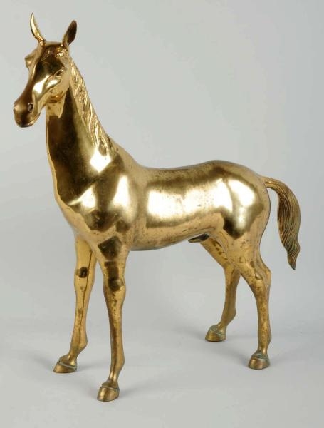 LARGE STANDING BRASS HORSE.                       