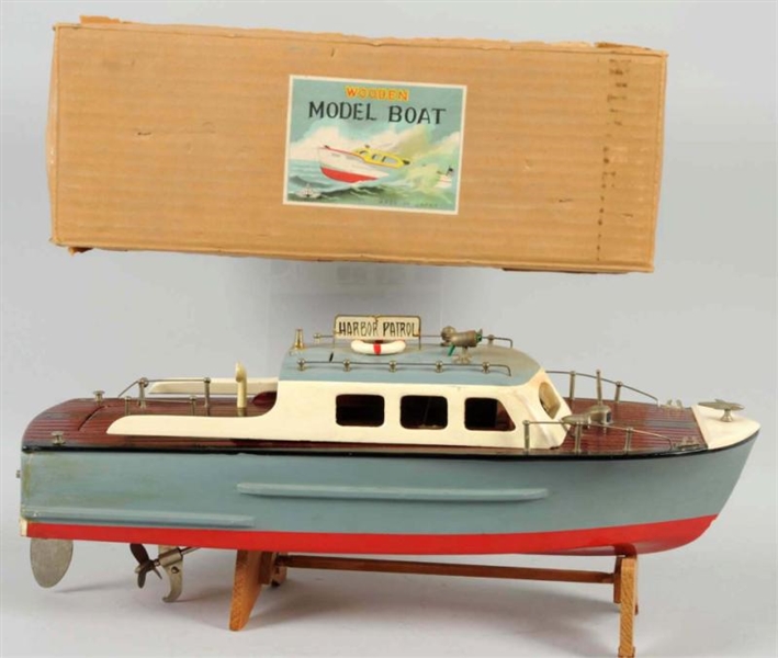 WOODEN BATTERY-OPERATED BOAT TOY.                 