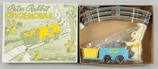 PRIDE LINES PETER RABBIT CHICK-MOBILE TOY.        