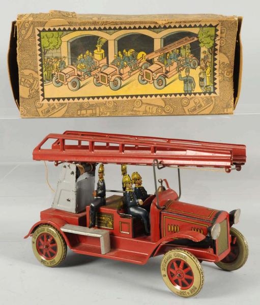 TIN LITHO TIPPCO FIRE LADDER TRUCK WIND-UP TOY.   