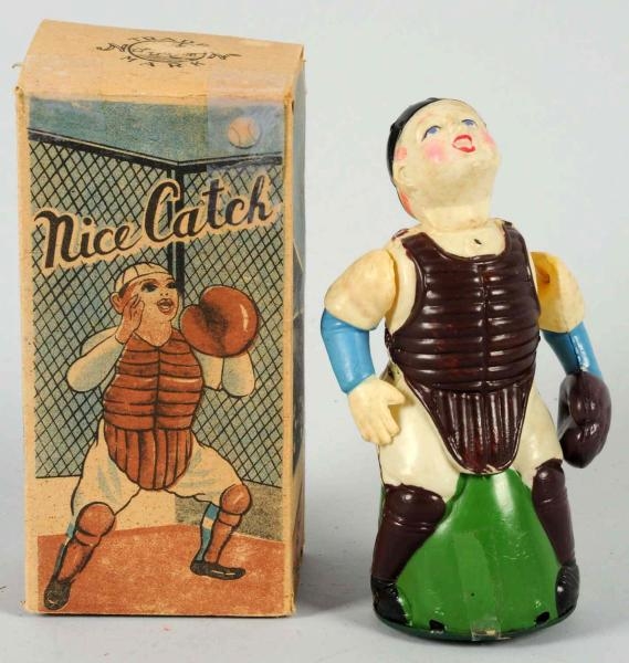 CELLULOID BASEBALL CATCHER WIND-UP TOY.           