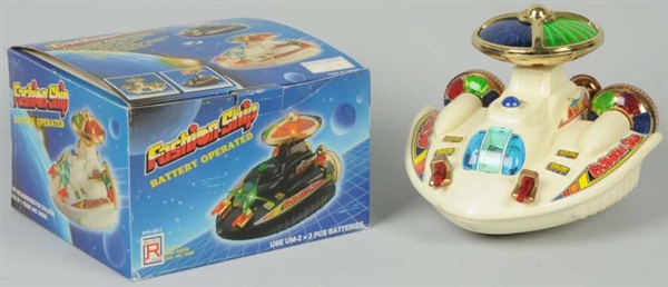 BATTERY-OPERATED FASHION SPACESHIP TOY.           