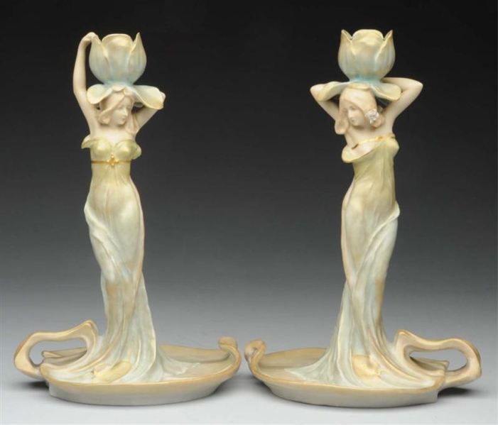 PAIR OF WAHLISS CERAMIC FIGURAL CANDLESTICKS.     