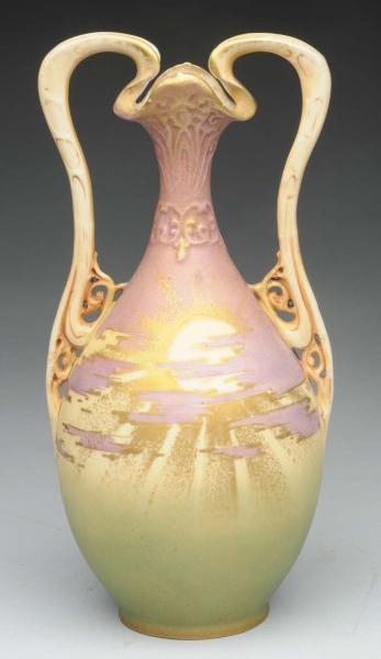 AMPHORA CERAMIC TWO-HANDLED RISING SUN VASE.      