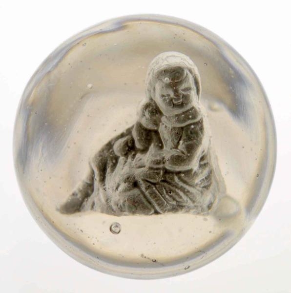 CHILD HOLDING DOLL SULPHIDE MARBLE.               