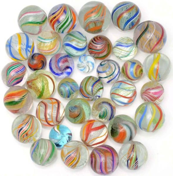 LOT OF 35: SWIRL MARBLES.                         