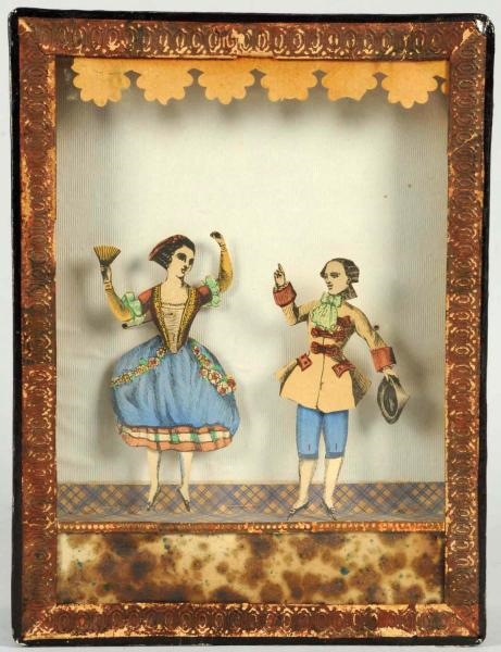EARLY MECHANICAL PAPER FIGURE DANCING TOY.        
