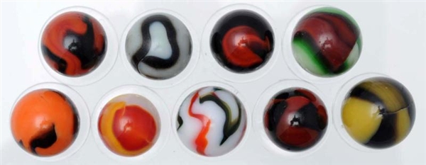 LOT OF 9: ASSORTED MACHINE MADE MARBLES.          