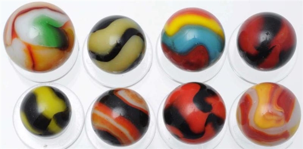 LOT OF 8: ASSORTED PELTIER MARBLES.               