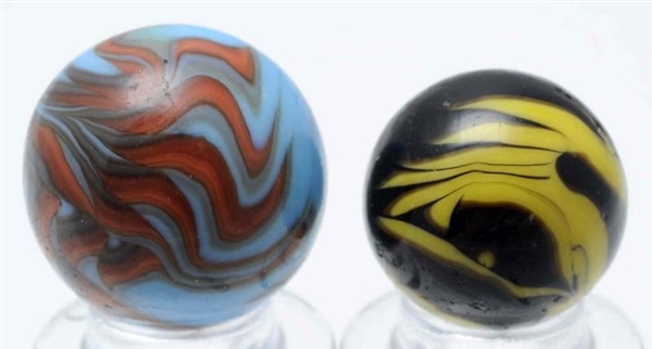 LOT OF 2: CHRISTENSEN AGATE FLAME MARBLES.        