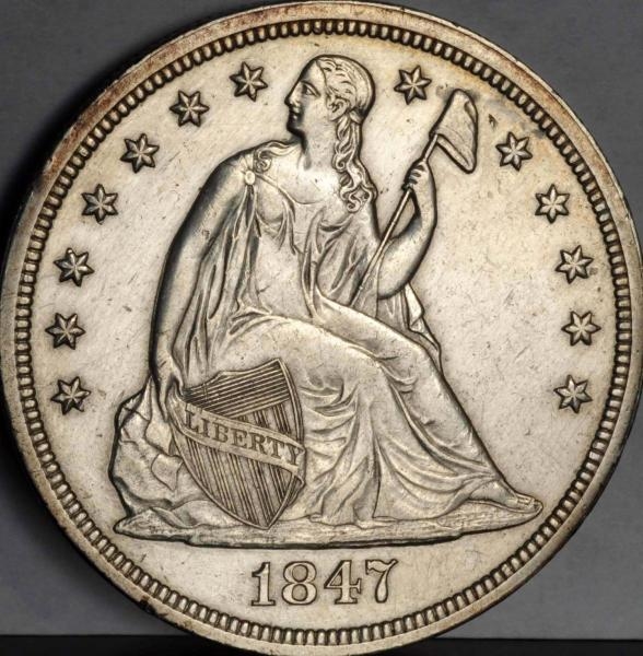 1847 SEATED LIBERTY DOLLAR AU+.                   