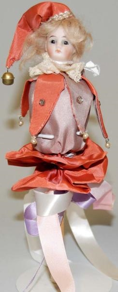 COURT JESTER BISQUE HEAD DOLL.                    