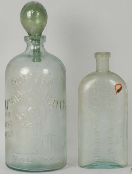 LOT OF 2: GREEN GLASS PHARMACY BOTTLES.           