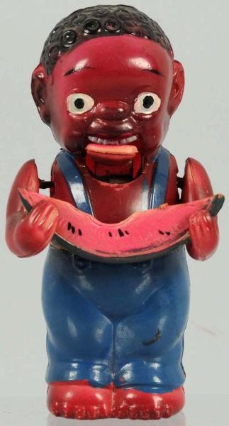 CELLULOID BLACK MAN EATING WATERMELON WIND-UP TOY 