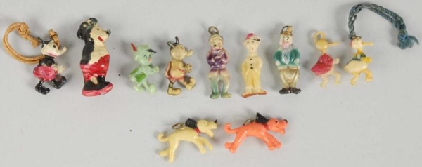 LOT OF 11: DISNEY CELLULOID CHARMS.               
