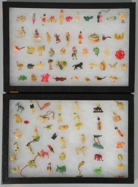 LOT OF 90: CELLULOID BREAD TIES & CHARMS.         