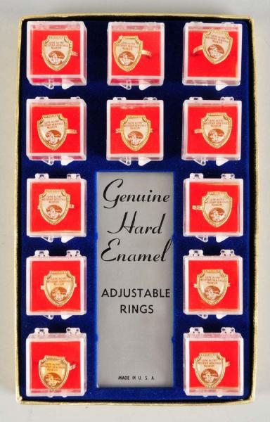 GENE AUTRY DISPLAY WITH 12 BOXED RINGS.           