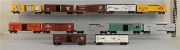 LOT OF 12: KMT FREIGHT TRAIN CARS.                