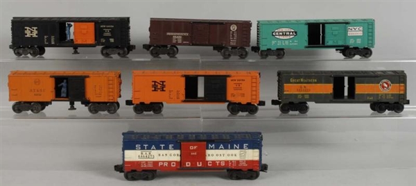 LOT OF 7: LIONEL POST-WAR BOXCARS.                