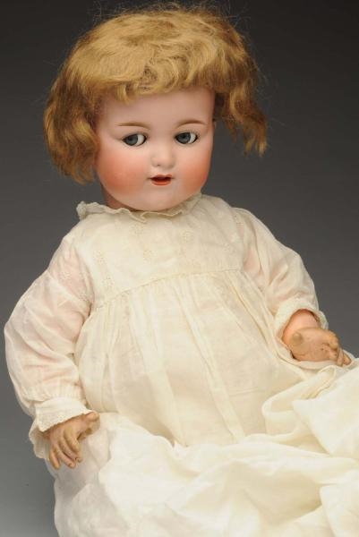 LIFE-SIZE A.M. 990 CHARACTER BABY DOLL.           