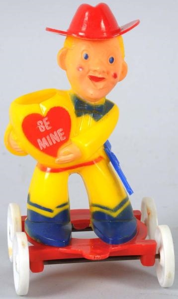 PLASTIC VALENTINE COWBOY CANDY CONTAINER.         