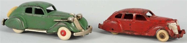 LOT OF 2: CAST IRON HUBLEY AUTOMOBILE TOYS.       