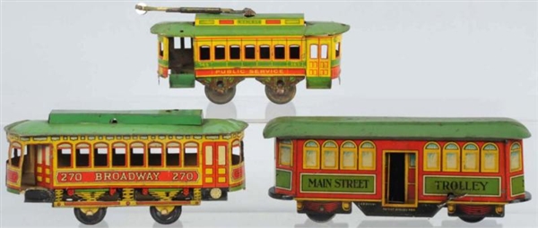 LOT OF 3: TIN LITHO TROLLEY TOYS.                 