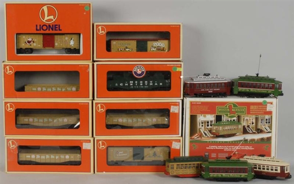 LOT OF 9: LIONEL CHRISTMAS RELATED TRAIN ITEMS.   