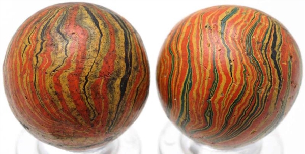 LOT OF 2: PAPER MACHE MARBLES.                    