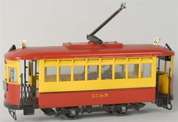 CONTEMPORARY SPANISH TROLLEY CAR TOY.             