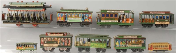 LOT OF 9: TIN LITHO FRICTION TROLLEY TOYS.        