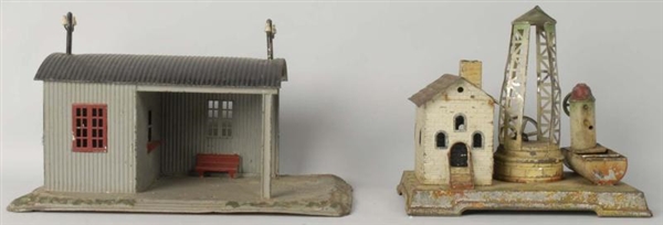 LOT OF 2: HAND-PAINTED TIN TRAIN ACCESSORIES.     
