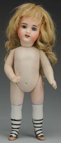 DESIRABLE GERMAN ALL-BISQUE CHILD DOLL.           
