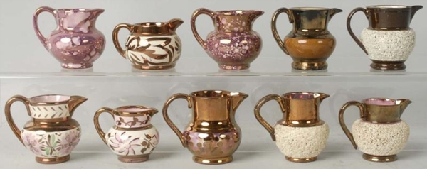LOT OF 10: COPPER LUSTER PITCHERS.                