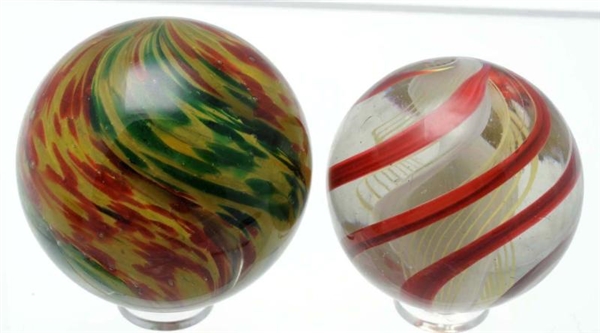 LOT OF 2: LARGE HANDMADE MARBLES.                 