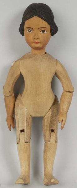 SWISS HAND-CARVED WOODEN DOLL.                    