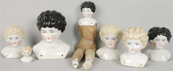 LOT OF 7: GERMAN CHINA & BISQUE DOLL HEADS.       