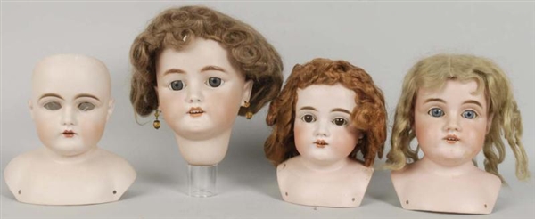 LOT OF 4: GERMAN BISQUE DOLL HEADS.               