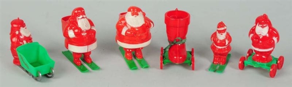LOT OF 6: 1950S PLASTIC SANTA CANDY CONTAINERS.   