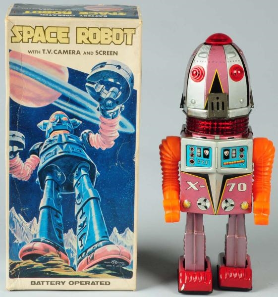 TIN LITHO BATTERY-OPERATED SPACE ROBOT X-70.      