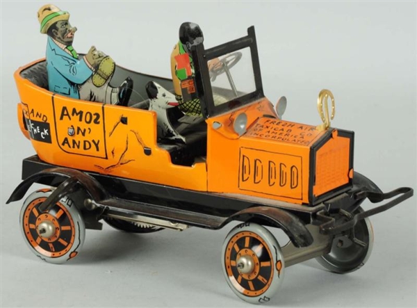 TIN LITHO AMOS N ANDY TAXI WIND-UP TOY.          