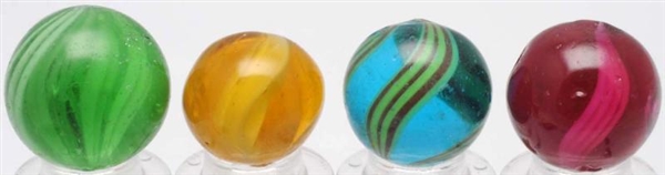 LOT OF 4: COLORED GLASS SWIRL MARBLES.            