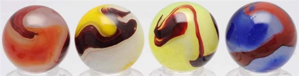 LOT OF 4: AKRO AGATE OXBLOOD MARBLES.             