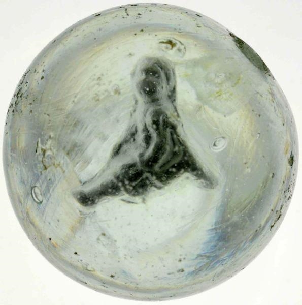 GIRL IN CHAIR SULPHIDE MARBLE.                    